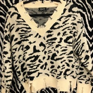 Blue B black and white cheetah sweater